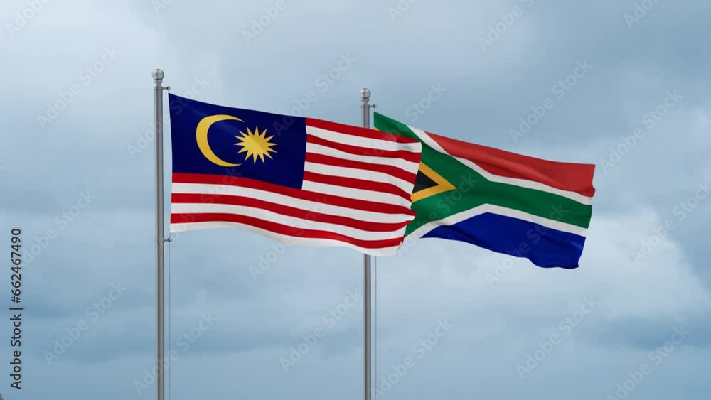 Republic of South Africa and Malaysia flag waving together on cloudy sky, endless seamless loop, two country cooperation concept Republic of South Africa and Malaysia flag waving together on cloudy sky, endless seamless loop, two country cooperation concept