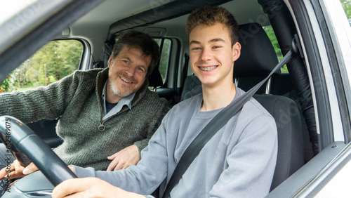 Teenager and father in the car