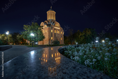 Ancient ukrainian Pyatnytska church and reflection
 photo