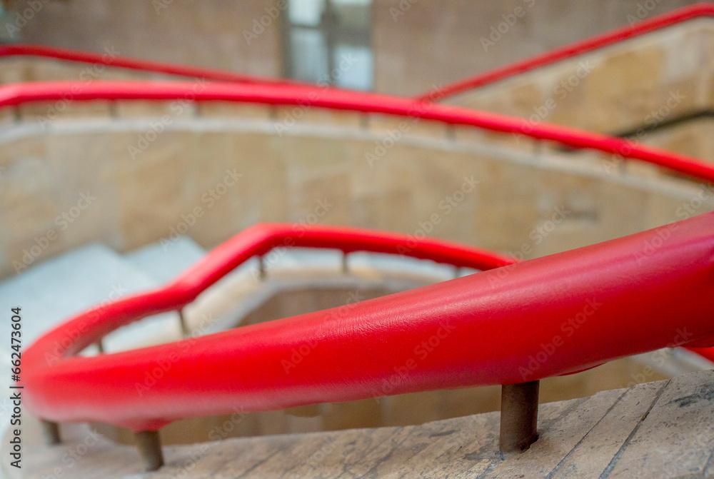 staircase with red railings for background