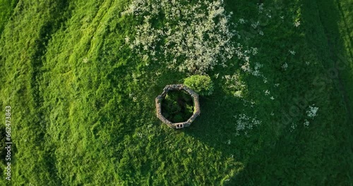 The ruins of an ancient temple stand on a hill 4k photo