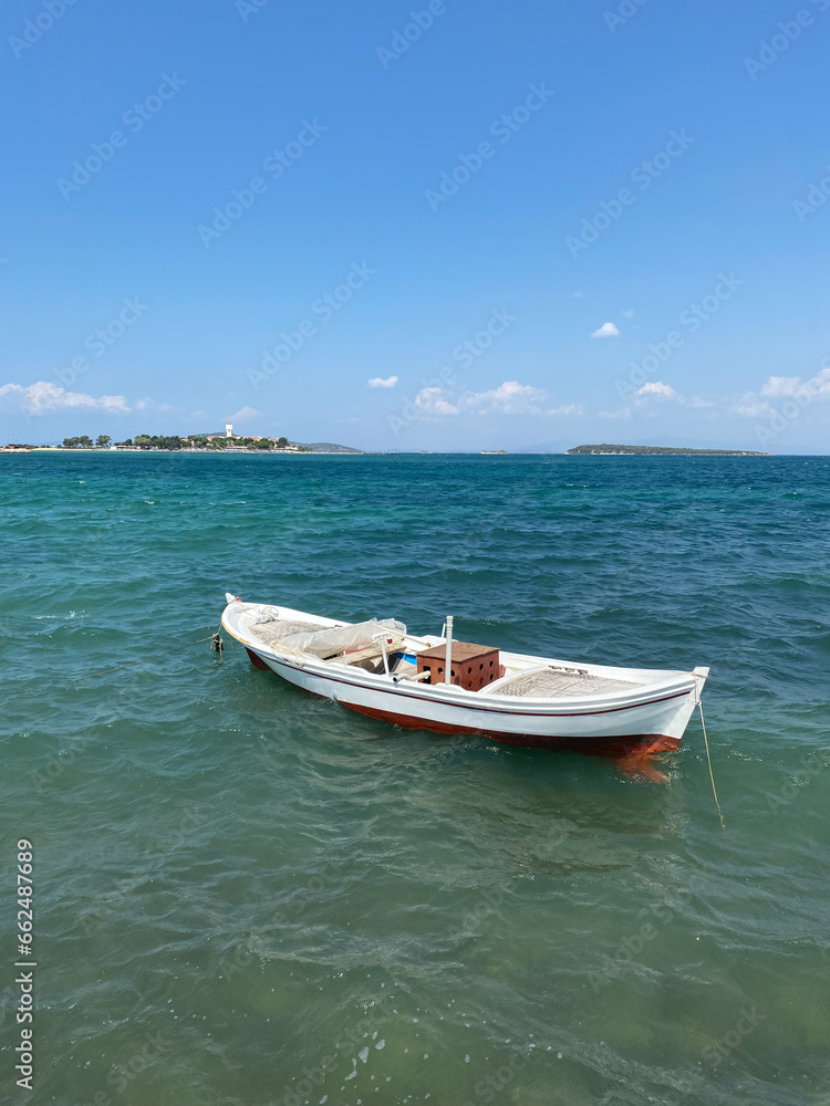 Small fishing boat in the cost of Aegean sea in Urla, Izmir, Turkey
