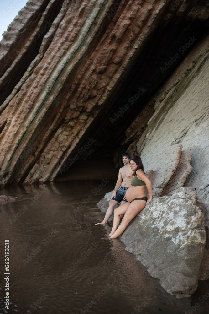 pregnant couple on the beach pregnant couple on the beach