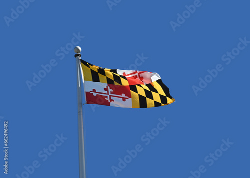 Maryland state flag flying in the daytime