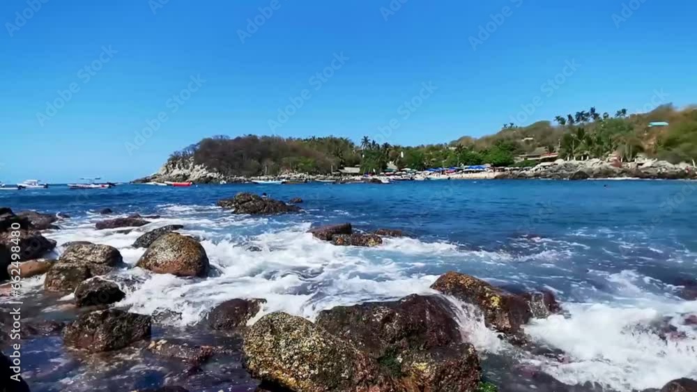Beach sand blue turquoise water waves rocks panorama Puerto Escondido. Beach sand blue turquoise water waves rocks panorama Puerto Escondido.