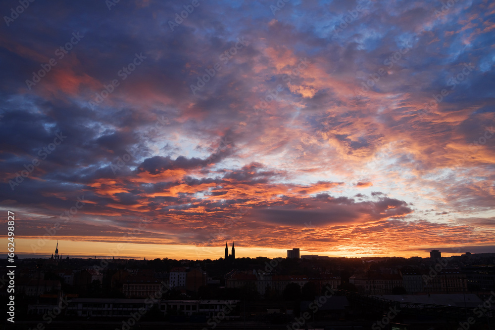 Sunrise on the background of the city panorama on the horizon. Sunrise at Prague. Sunrise on the background of the city panorama on the horizon. Sunrise at Prague.