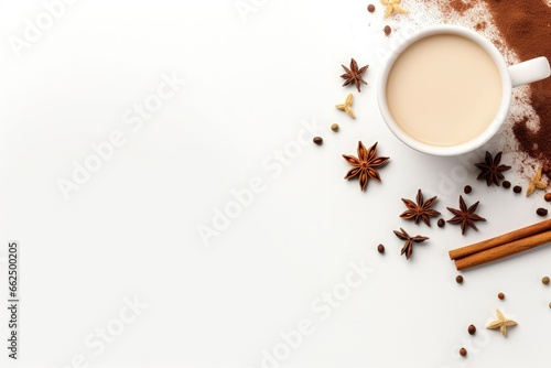 Indian drink with black tea milk species creatively displayed on a white background from a top view photo