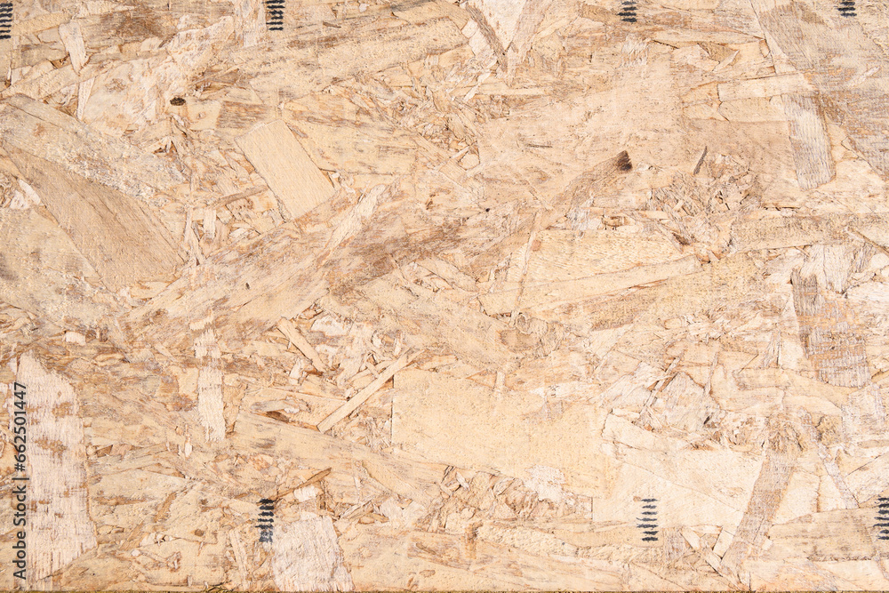 Closeup of a section of new Oriented Strand Board (OSB) engineered wood ...
