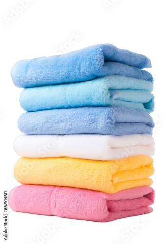 Neatly folded colorful towels on transparent white background