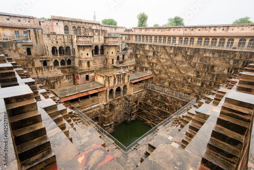Stepwells, also known as bawdi or baori, are unique to this country.  Chand Baori, it is one of the largest stepwells in the world. Rajasthan, India. photo