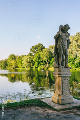 Sculpture close to the lake on the territory of Royal Wilanow Palace in Warsaw, Poland