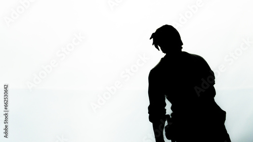 Silhouette of male action figure toy isolated on white background