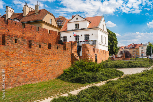 Old Town Warsaw. Towers and red brick walls of the historical Warsaw Barbican fort, Poland
