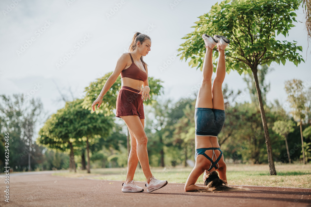 Fit And Flexible For Life Review Fit and flexible girls demonstrate strength and balance in a green park