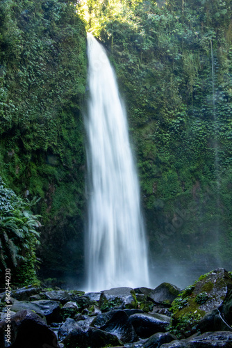 Long-exposure shot of waterfall and river in jungle - Bali  Indonesia