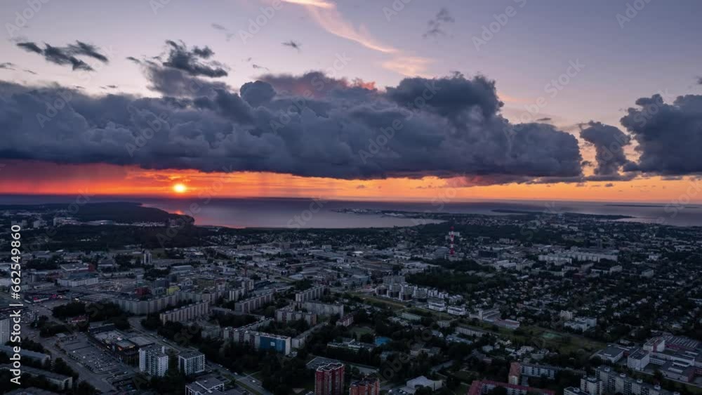 Tallinn Aerial hyper-lapse drone shot of a beautiful sunset over centre and Baltic sea, Estonia Tallinn Aerial hyper-lapse drone shot of a beautiful sunset over centre and Baltic sea, Estonia