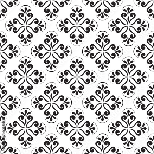 A seamless pattern with black and white geometric floral elements, with a damask graphic ornament.