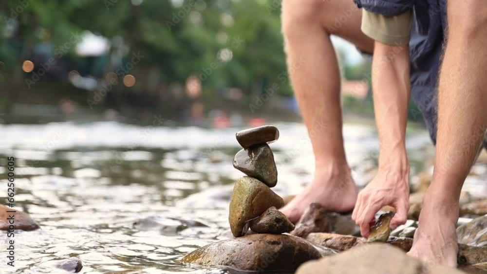 Male travel camping resort tourist was sitting and having fun with a ...
