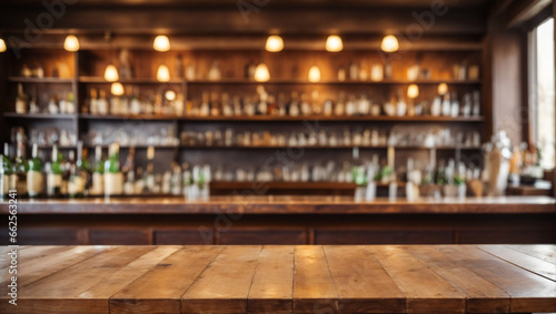 Empty wooden bar counter with defocused background. © adynue