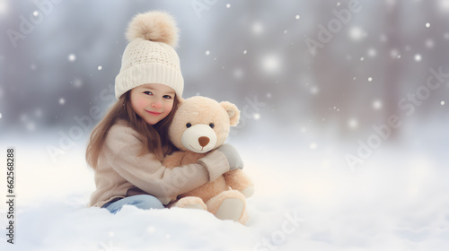 Little girl and toy teddy bear on snow field. Friendship, best friend concept.