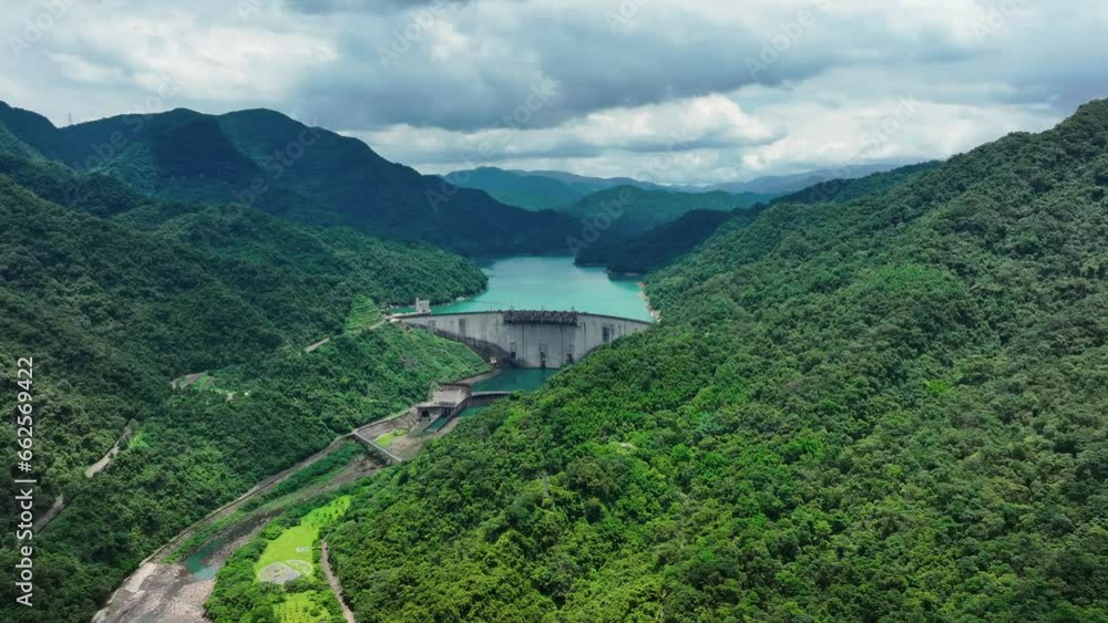 Idyllic mountain landscape in Taiwan with dam and lake of Feicui during cloudy day