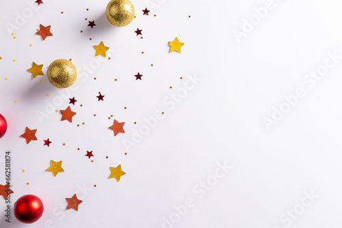Christmas stars, baubles decorations with copy space on white background