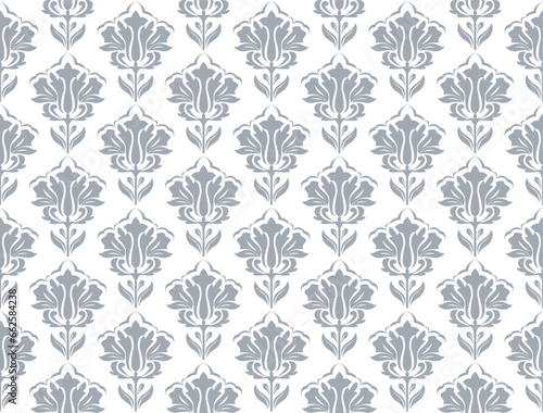 Wallpaper in the style of Baroque. Seamless vector background. White and gray floral ornament. Graphic pattern for fabric, wallpaper, packaging. Ornate Damask flower ornament.
