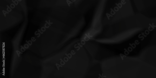 Dark crumple black fabric paper wrinkled poster template ,blank glued creased paper texture background. black paper crumpled backdrop background. used for cardboard and clarkboard.