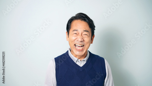 Foto 大笑いするミドル男性