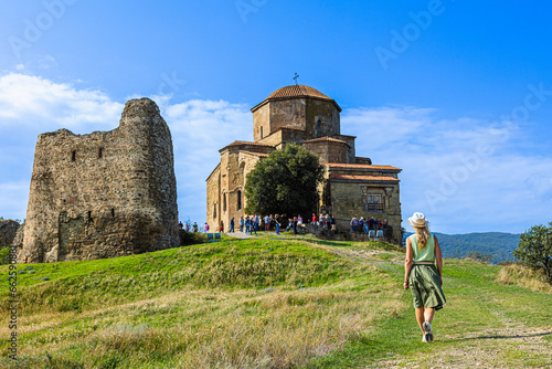 Tourist walk to the Jvari monastery in Georgia, Mtskheta photo