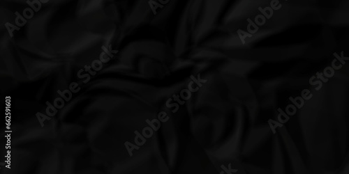 Crumpled black paper texture. Black crumpled paper texture crush paper. creased and wrinkled. Old dark black crumpled paper sheet background texture.	
