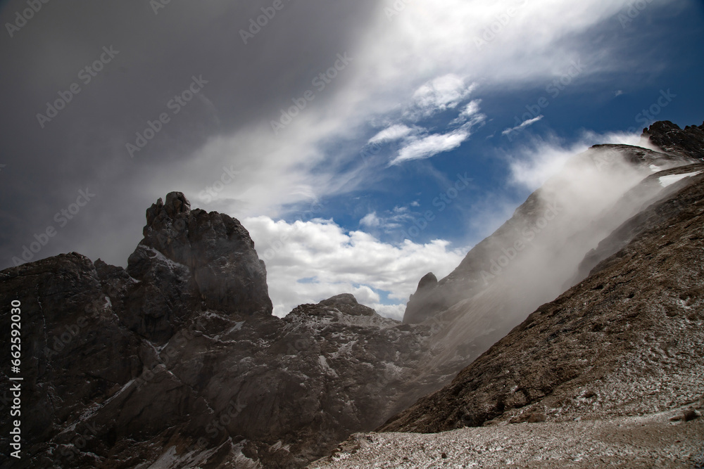 The rocks at Serauta in summer mist, Marmolada, Dolomites, Italy