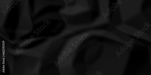 Dark crumple black fabric paper wrinkled poster template ,blank glued creased paper texture background. black paper crumpled backdrop background. used for cardboard and clarkboard.