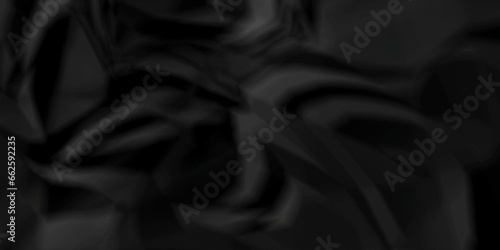 Dark crumple black fabric paper wrinkled poster template ,blank glued creased paper texture background. black paper crumpled backdrop background. used for cardboard and clarkboard.