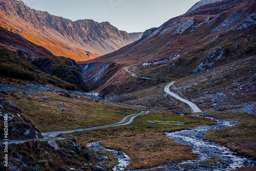 Landscape of the mountains, stream, forest and trail in autumn in Switzerland. photo