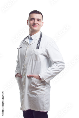 Medicine Concepts. Portrait of Positive Professional Confident Male GP Doctor Posing in Doctor's Smock And Endoscope with Hands In Pockets Against White.