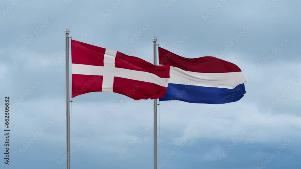 Netherlands flag and Denmark flag waving together on cloudy sky, endless seamless loop, two country relations concept Netherlands flag and Denmark flag waving together on cloudy sky, endless seamless loop, two country relations concept