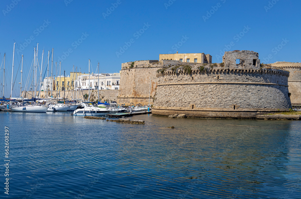 GALLIPOLI, ITALY, JULY 16, 2022 - View of the tower of Gallipoli castle in the seaside town of Gallipoli, province of Lecce, Puglia, Italy
