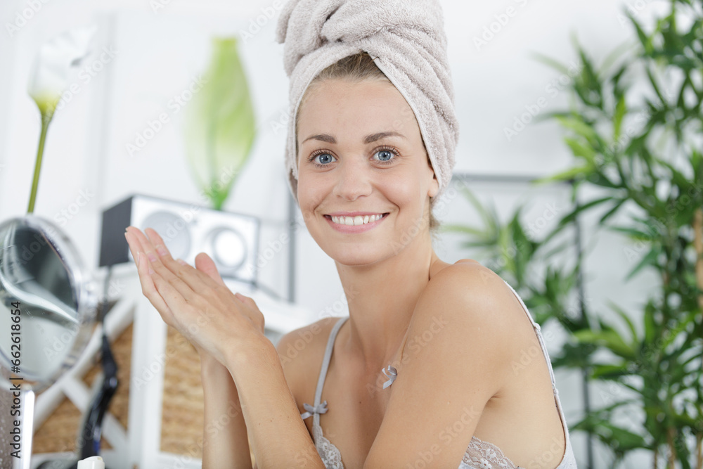 a happy woman with towel head a happy woman with towel head