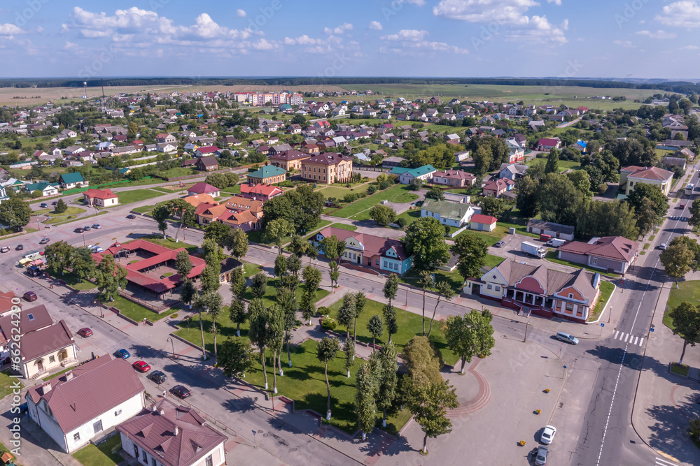 aerial view on provincial city or big village housing area with many buildings, roads and garden.