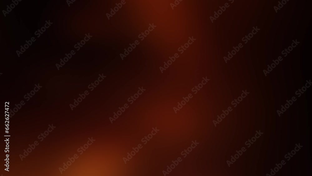 Blurred flames of fire on a black background. Light background.