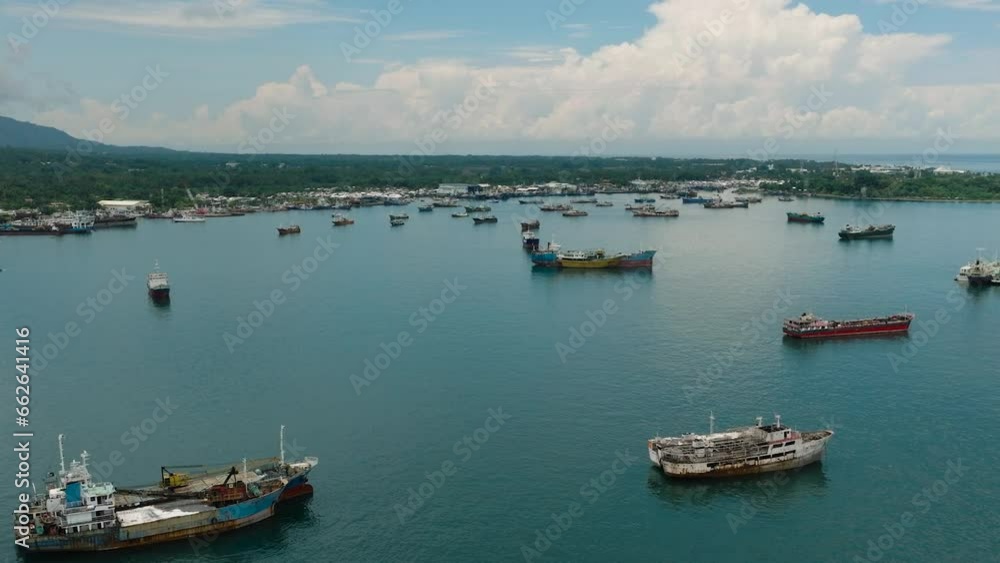 Fishing Boats floating over the sea in Zamboanga. Mindanao, Philippines. Aerial drone view. Fishing Boats floating over the sea in Zamboanga. Mindanao, Philippines. Aerial drone view.