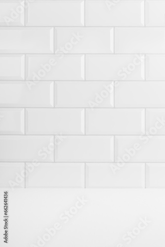 Elegant white abstract stage with white glossy ceramic rectangle tile wall, mockup abstract interior of bathroom, kitchen or scene for presentation, show, design in classic mediterranean style.