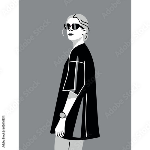 Stylish young woman in glasses dressed in oversize clothes