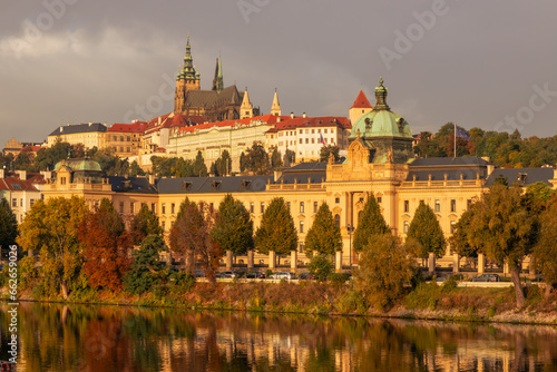 Autumn views from Prague. Picturesque autumn Prague in the morning sun. The Vltava River with the Charles Bridge  the waterfront and houses of Mala Strana and the dominant Prague Castle. Czechia