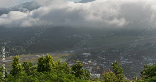 Sheets of mist clouds move through the city.