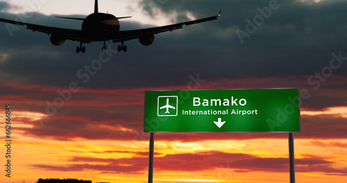 Tableau sur toile Plane landing in Bamako Mali airport with signboard