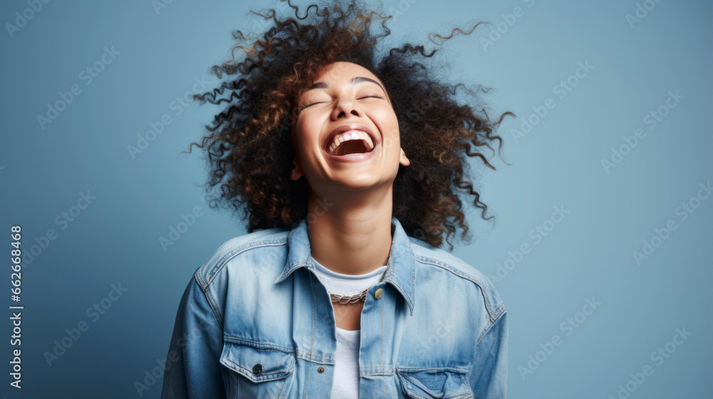 Enjoy happy african american girl wearing denim jacket looking up smiling cheerfully against background Enjoy happy african american girl wearing denim jacket looking up smiling cheerfully against background