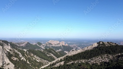 Aerial view of beautiful and legendary mountain formations in Benet Rocks. Mountain range in the Puertos Natural Park in the province of Tarragona, where hiking is practiced photo