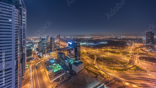 Photography Aerial view of media city and al barsha heights district area all night timelapse from Dubai marina